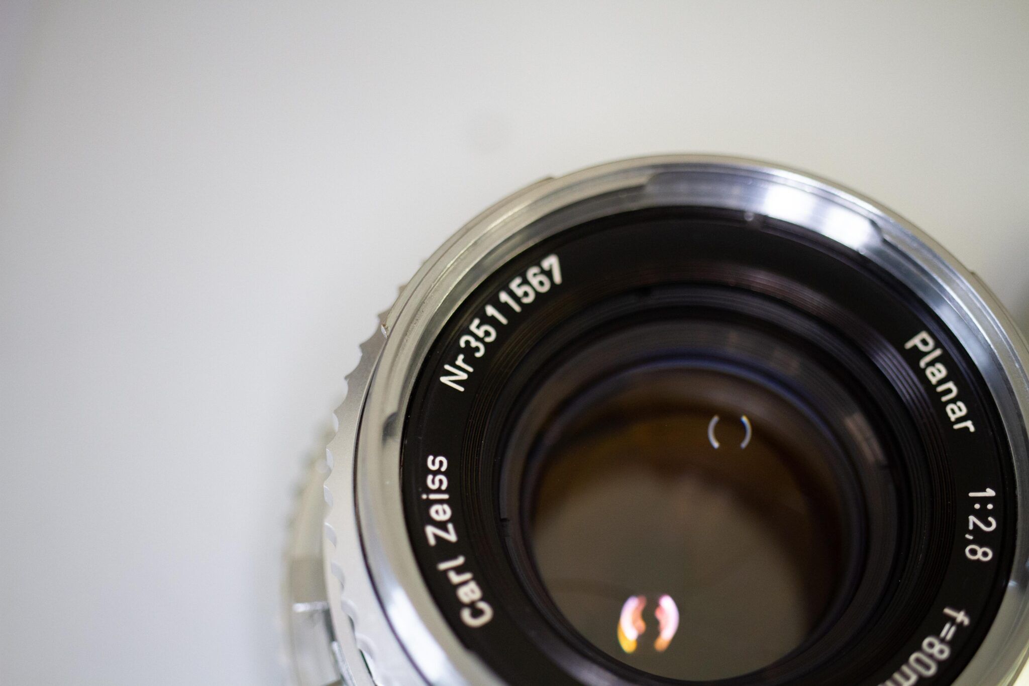 Carl Zeiss Planar 50mm 1.7 CY con polvere interna: pulizia lente frontale