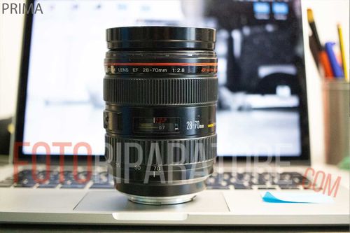 Canon 28-70 lente opacizzata – Scollatura, pulizia e reincollaggio.